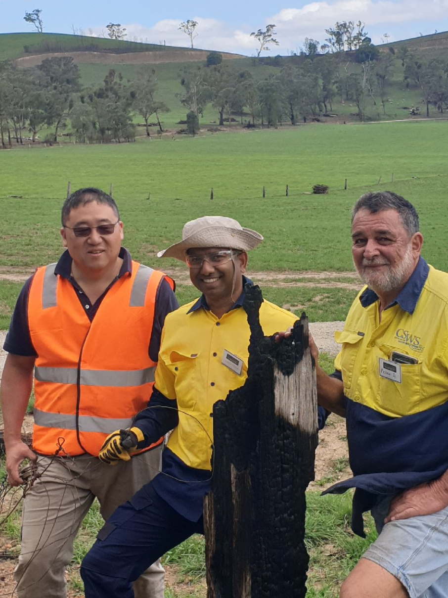 Above – Jason CSO, Navindra Accountant and Peter Senior Agronomist next to a burnt fence post. 